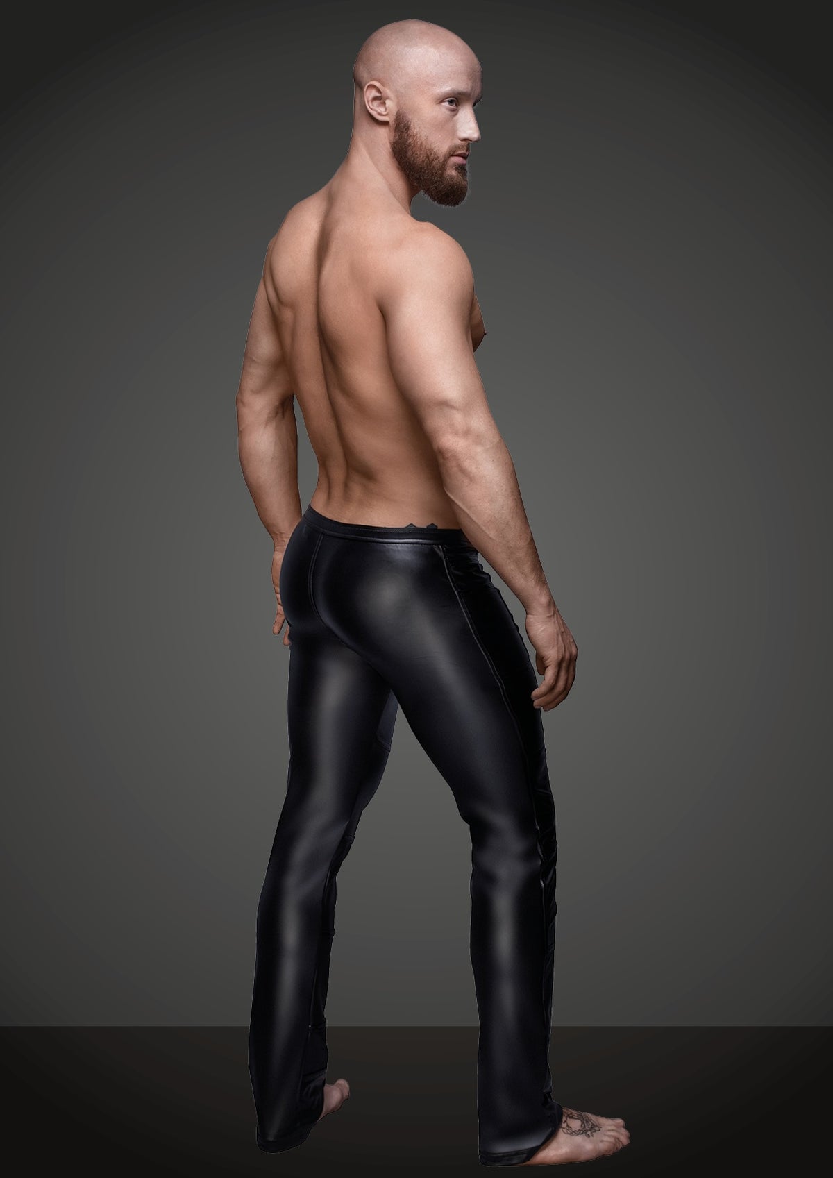 Men’s black fitted long pants, rear three-quarter view.