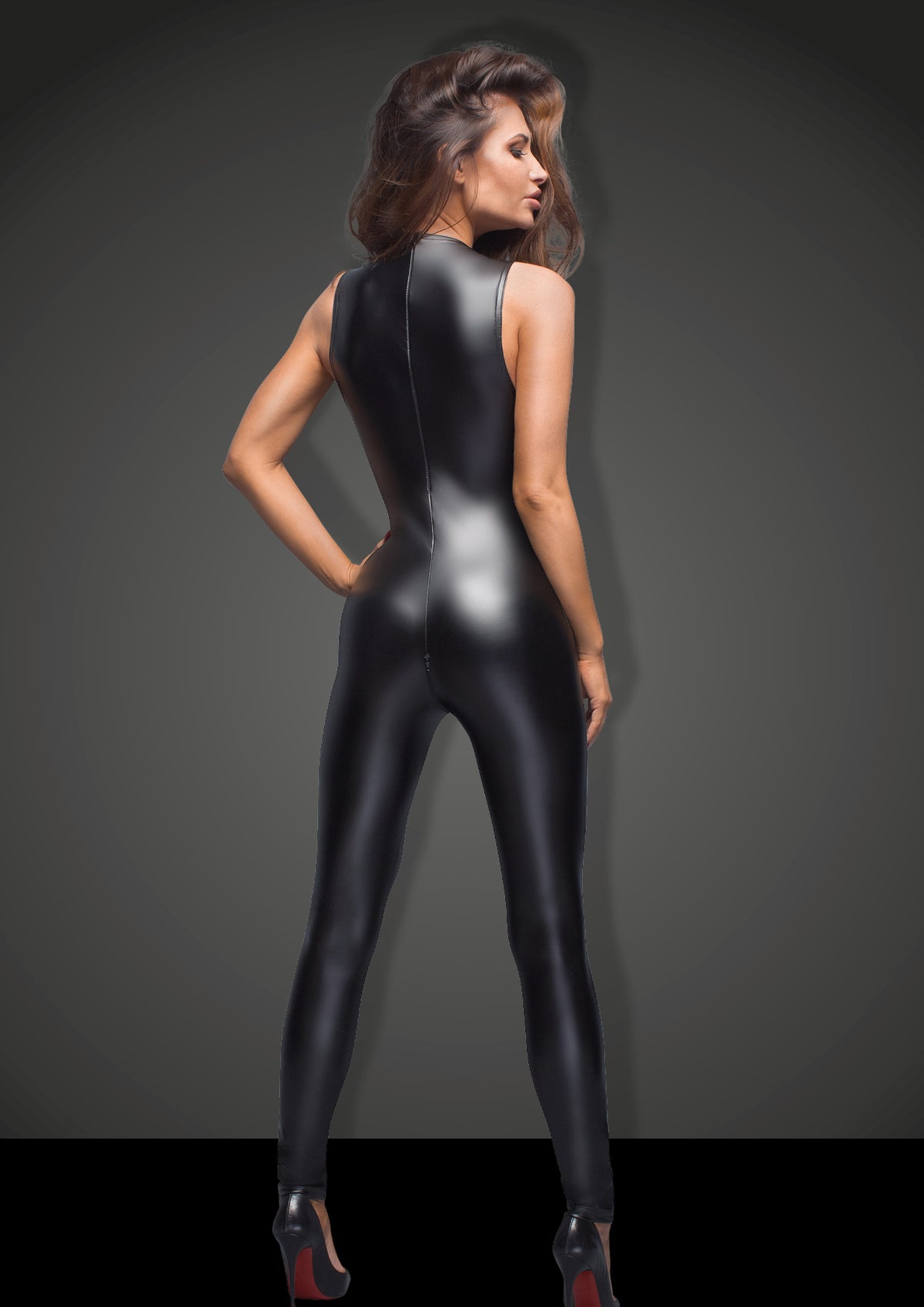 Woman wearing black Sleeveless powerwetlook overall with lace back view